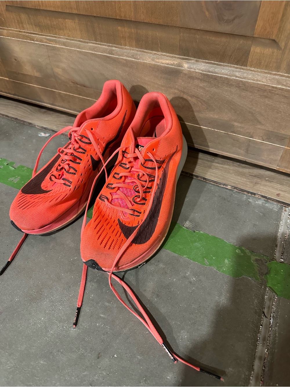 Nike Coral Pink Running Shoe with Black Swoosh